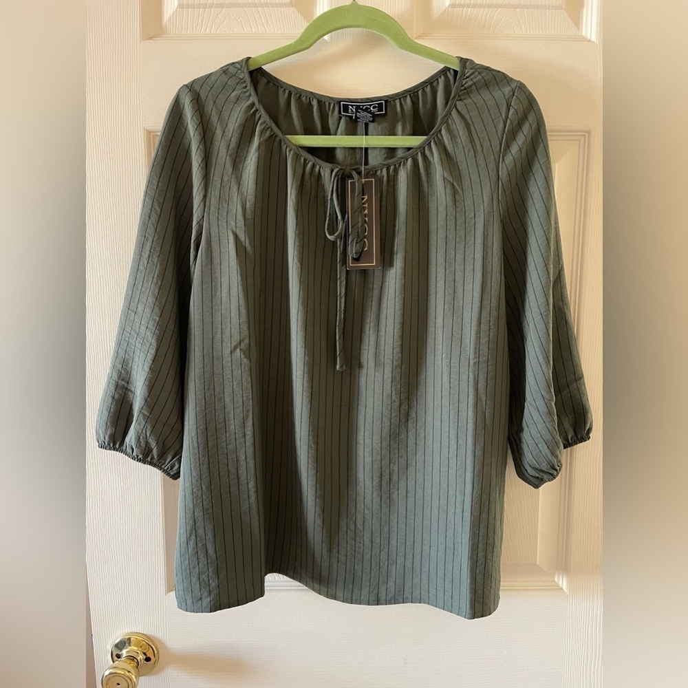 New York clothing company shirt • NWT • womans M